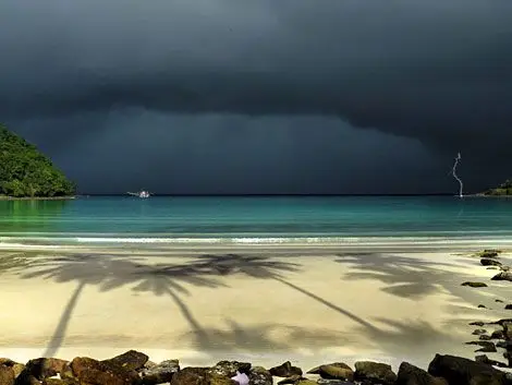 Sunshine and lightning during the rainseason on Ko Kood